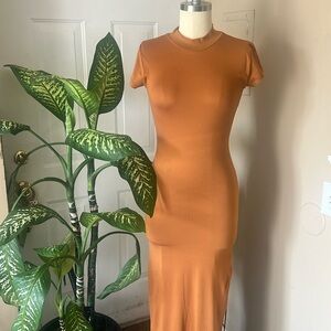 Medium size maxi fitting dress with side splits.  Very comfortable